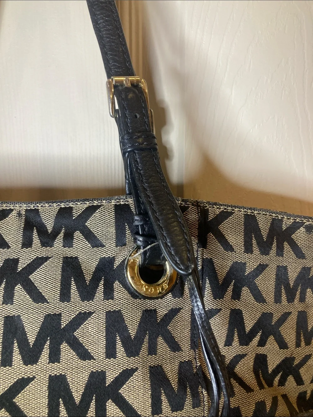 Michael Kors over logo